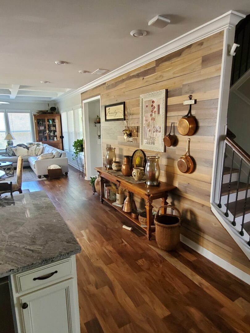 Wood-paneled hallway with hardwood floors.