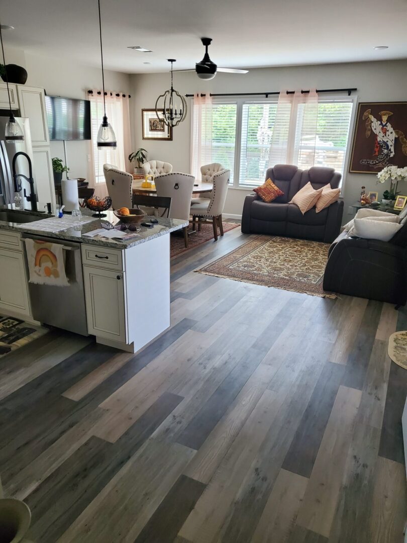 Wood floor in a modern kitchen and living room.
